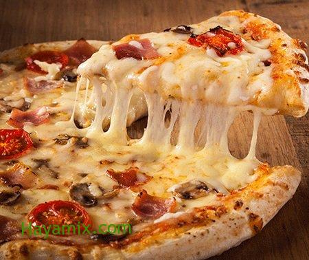 طريقة عمل عجينة البيتزا الأصلية في البيت بخطوات سهلة وبسيطة