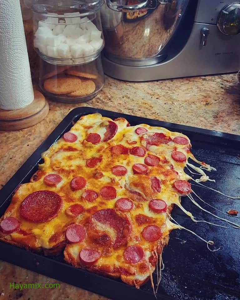طريقة تحضير عجينة البيتزا اللذيذة في عشر دقائق بسهولة في المنزل